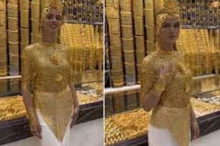  فتاة سعودية تفاجىء العالم بجمالها و ترتدي ثوباً من الذهب الخالص يغطي جسمها بالكامل.. وهذه قيمتها الضخمة 